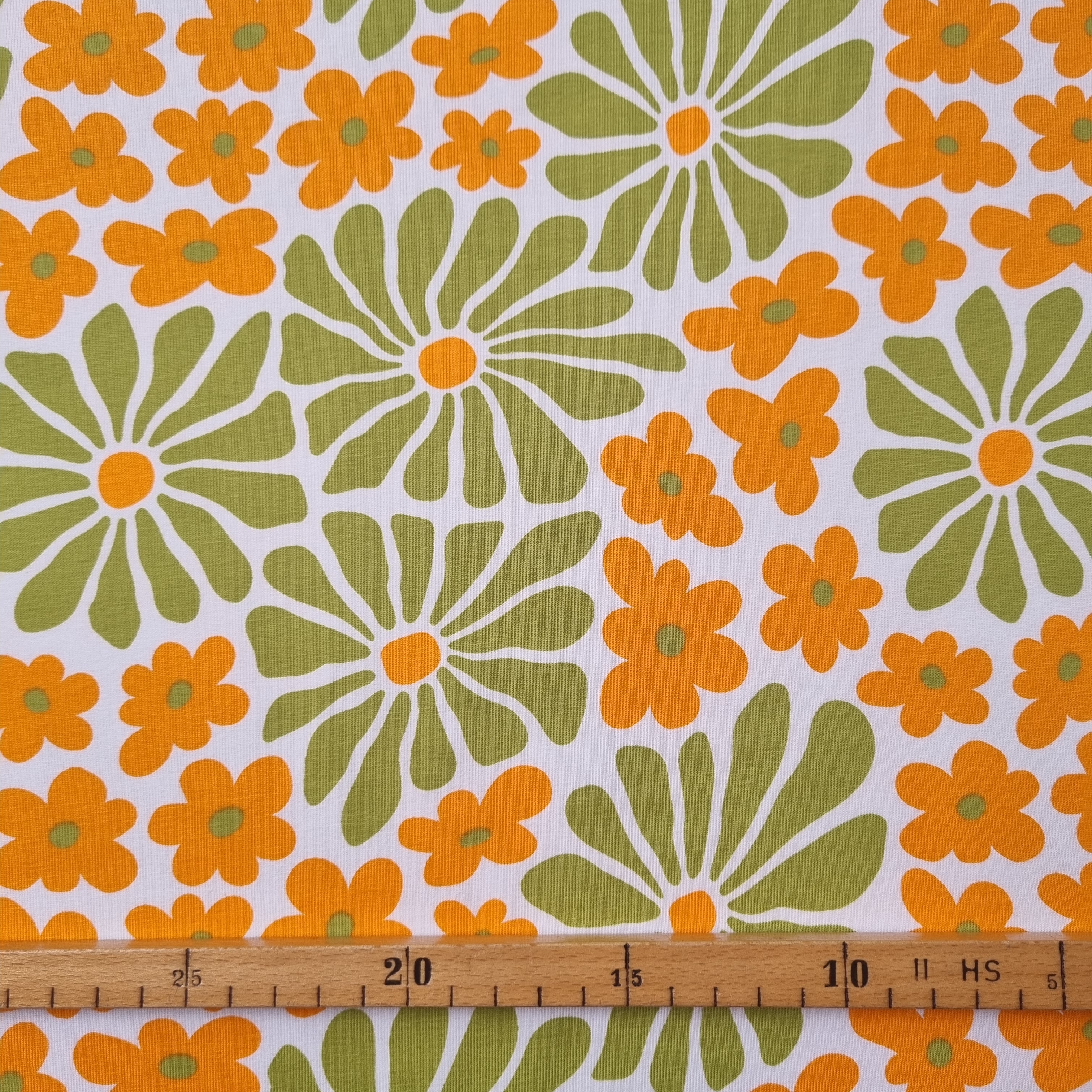 Baumwolljersey mit Retroblumen grün/orange jersey, neu Hemmers Itex Malu - Stoffhaus