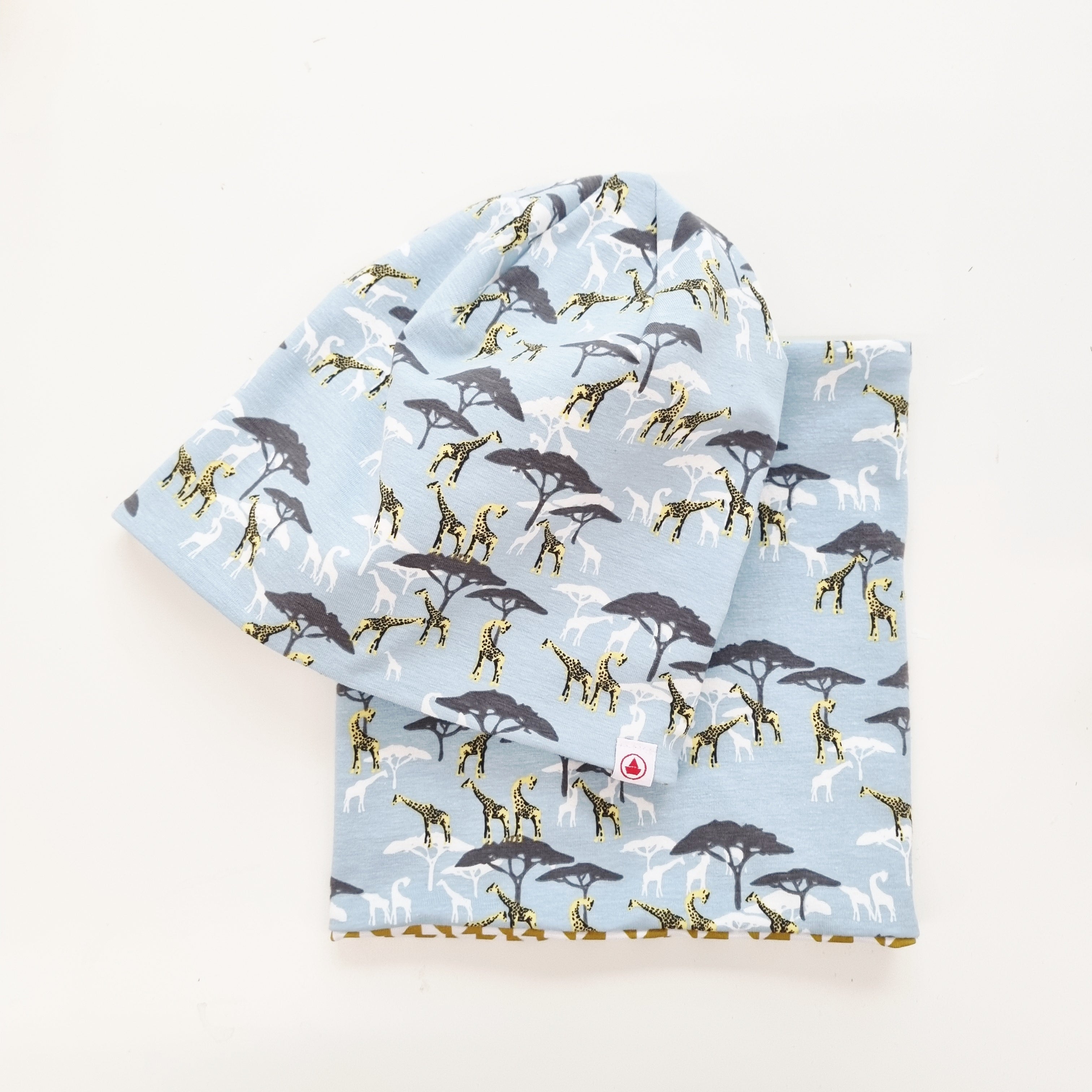 Beanie und EHalssocke zum Wenden mit Giraffenmuster Ferienkinder Malu - Stoffhaus