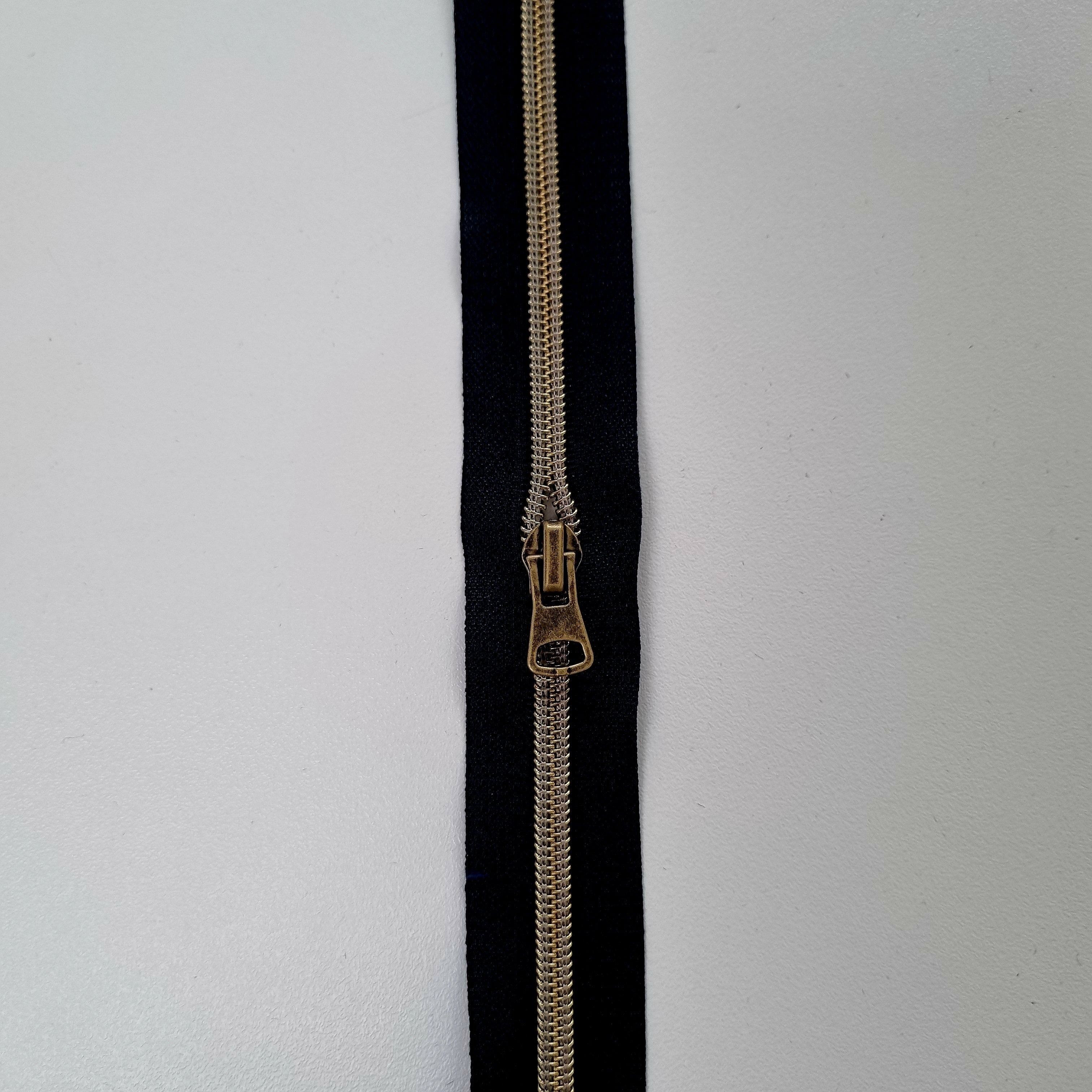 Endlosreißverschluß schwarz div. Farben Endlosreißverschluß Veno altgold Malu - Stoffhaus