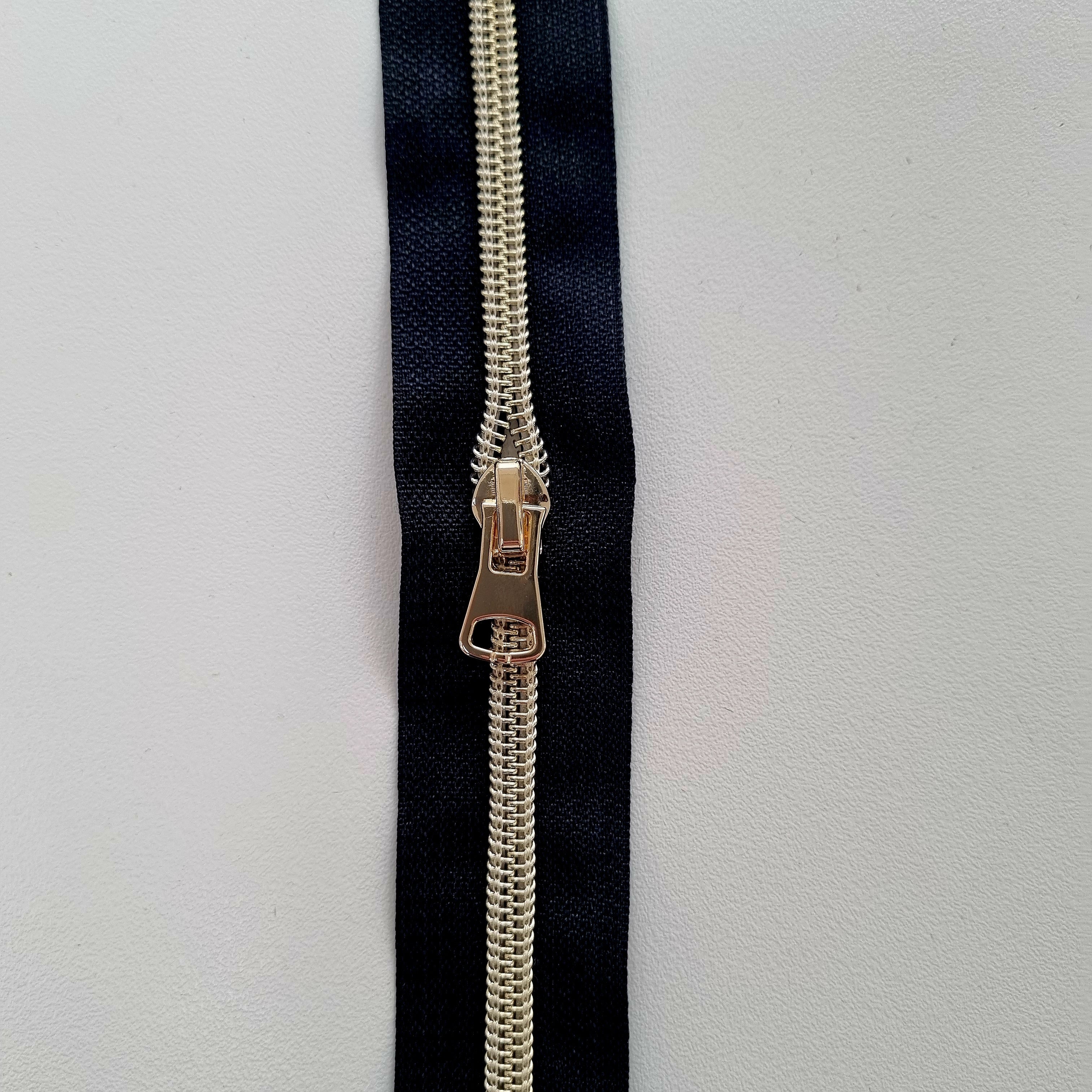 Endlosreißverschluß schwarz div. Farben Endlosreißverschluß Veno gold Malu - Stoffhaus