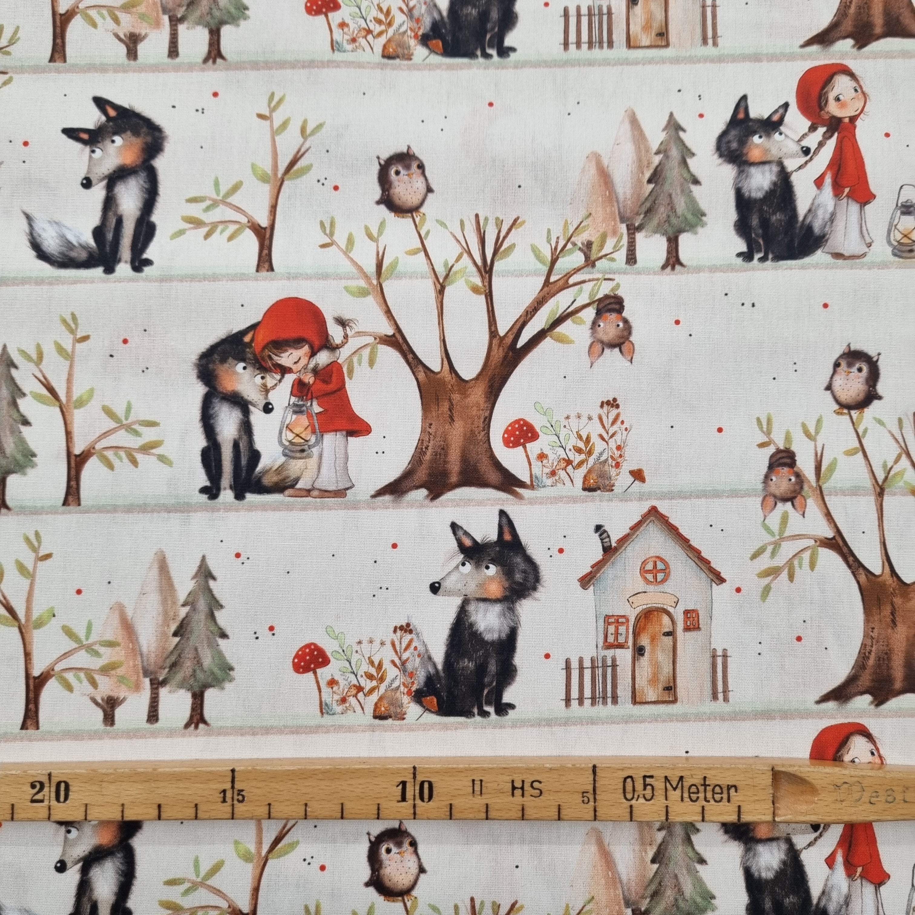 Rotkäppchen auf cremefarbenem Baumwolldruck Webstoff Swafing Malu - Stoffhaus