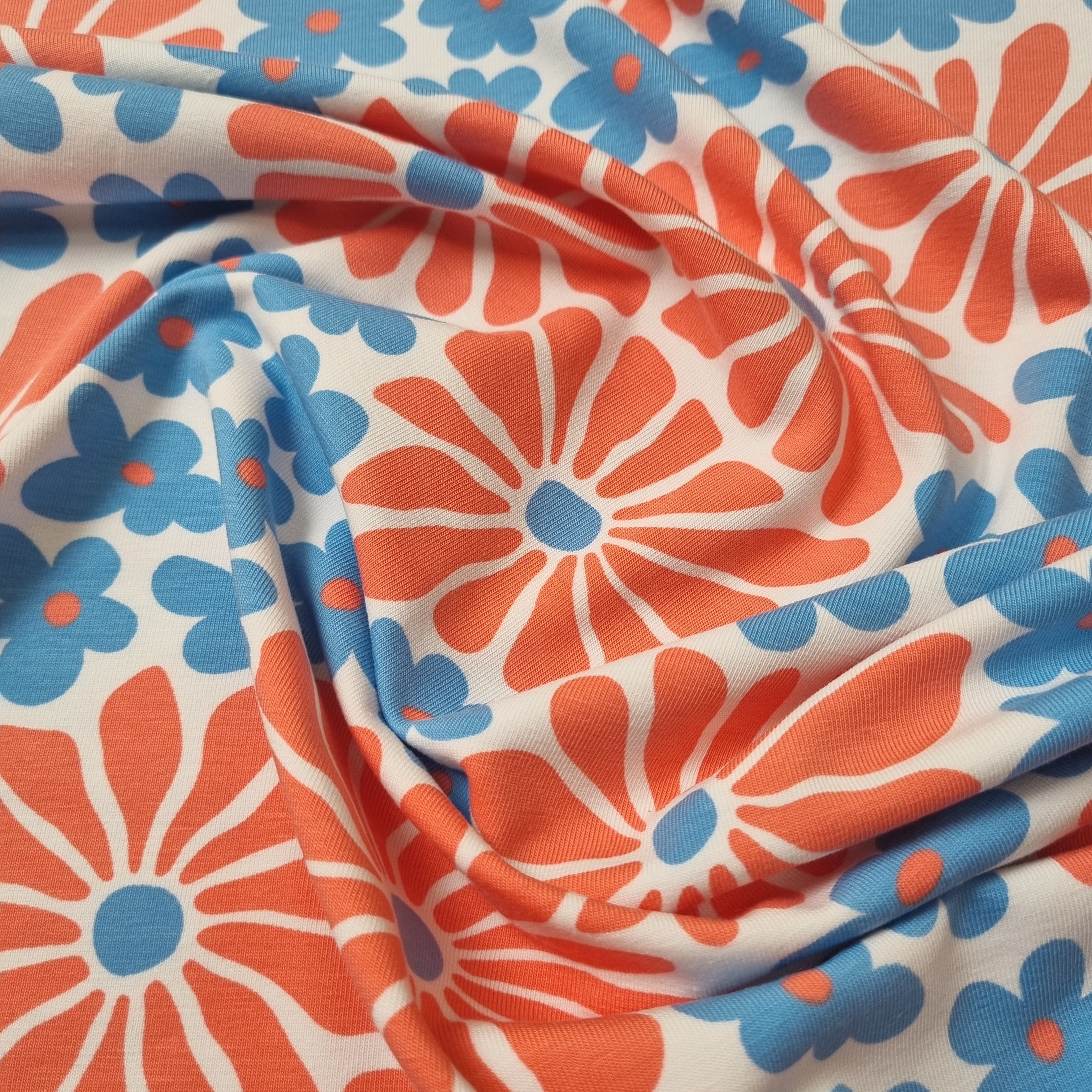 Baumwolljersey mit Retroblumen hellblau/rosa jersey, neu Hemmers Itex Malu - Stoffhaus