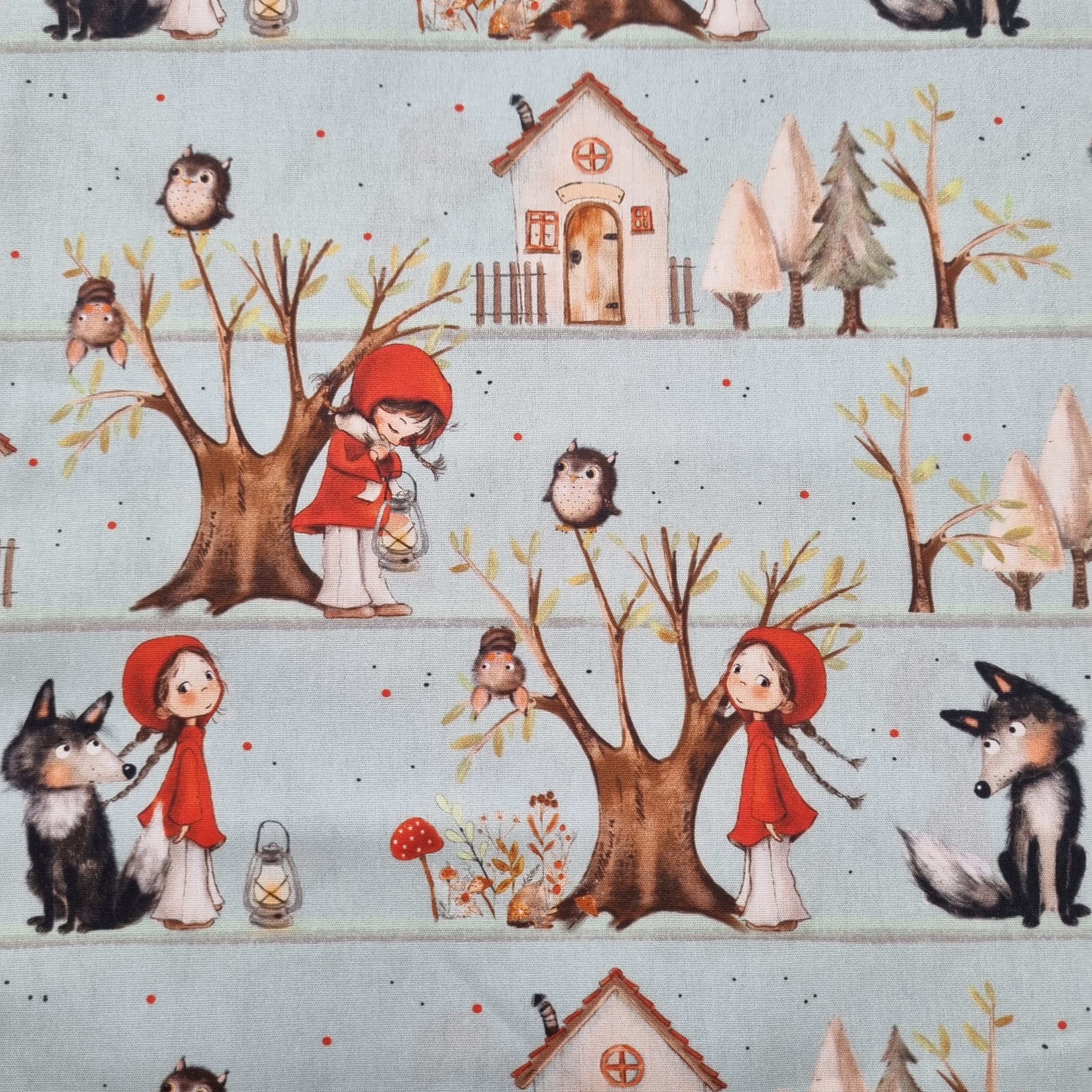 Rotkäppchen auf mintfarbenem Baumwolldruck Webstoff Swafing Malu - Stoffhaus