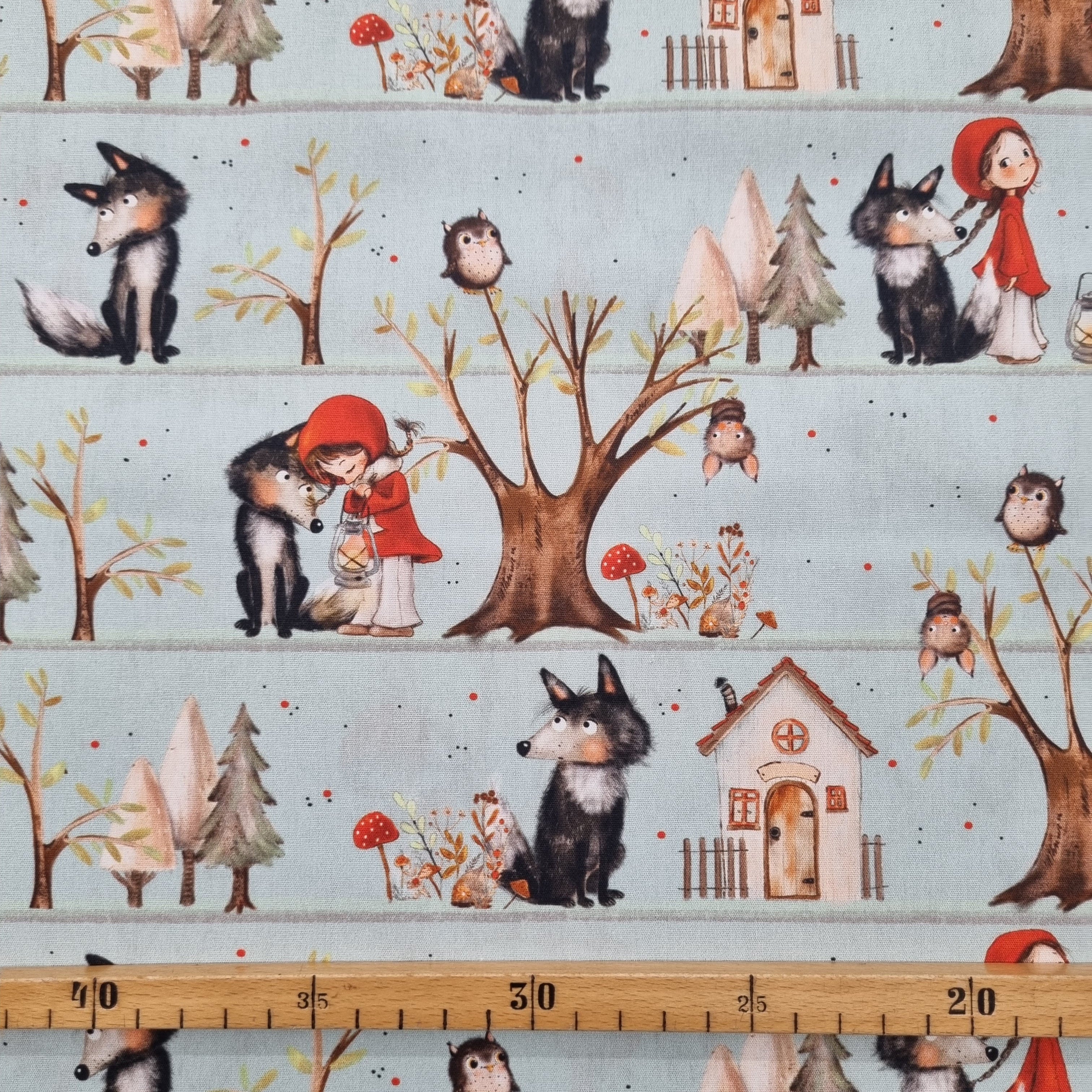 Rotkäppchen auf mintfarbenem Baumwolldruck Webstoff Swafing Malu - Stoffhaus